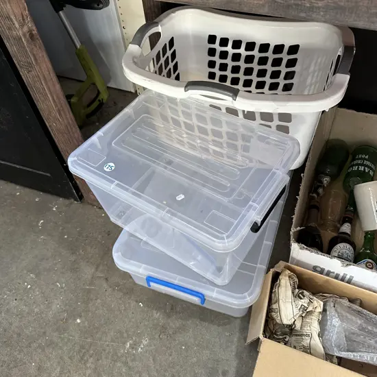 Two lidded bins plus laundry basket.