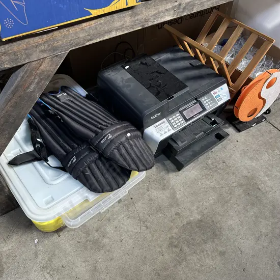 Large bay lot including lamp, mag rack, cricket pads etc.