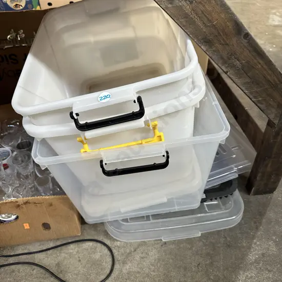 Three plastic bins plus assorted lids.