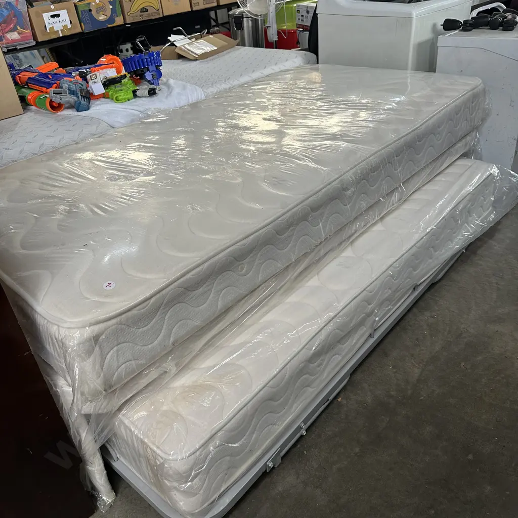 very tidy King single bed with pull out trundle mattress Image 1++