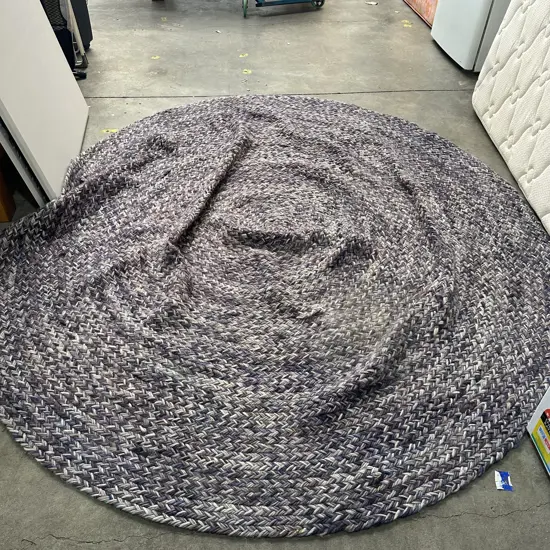 large rouind 2.4m felt rug as is