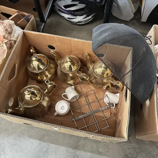 Four gold tea pots, food cover etc.
