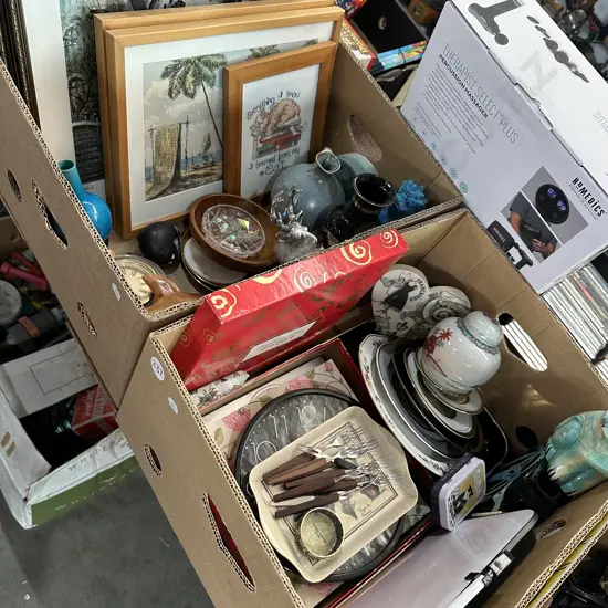 Two boxes pictures, clocks, crystals etc.