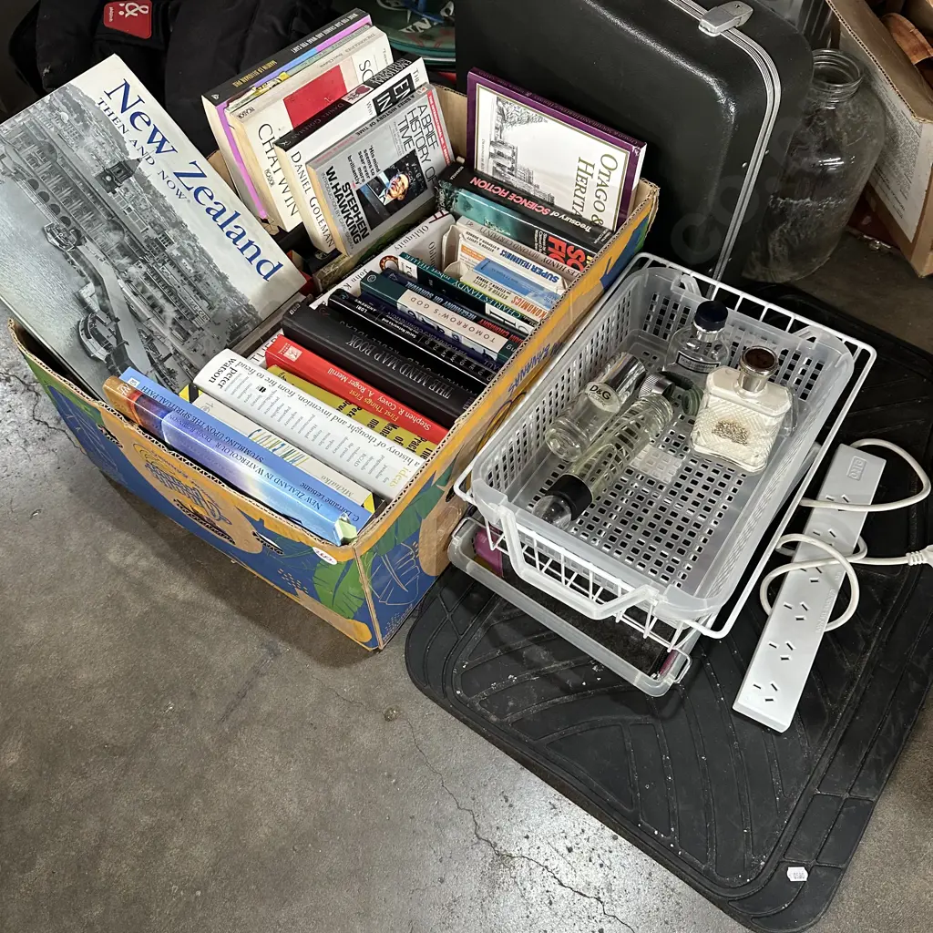 Box of books plus rubber car mats, aftershave etc. Image 1++