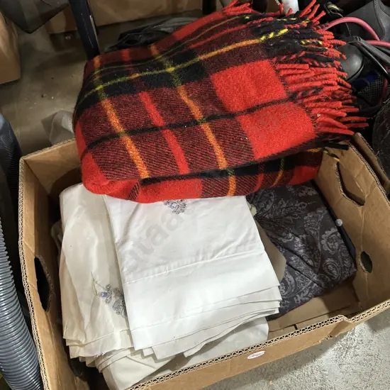 Bedding and picnic blanket.