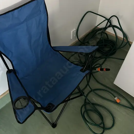 hose and folding chair