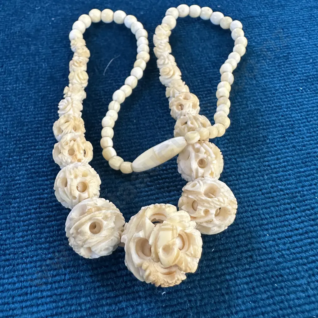 Ivory carved puzzle ball necklace Image 1++