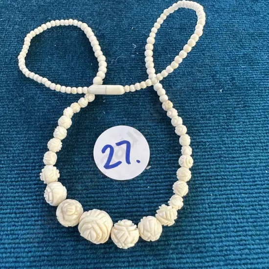 Ivory graduated carved ball necklace