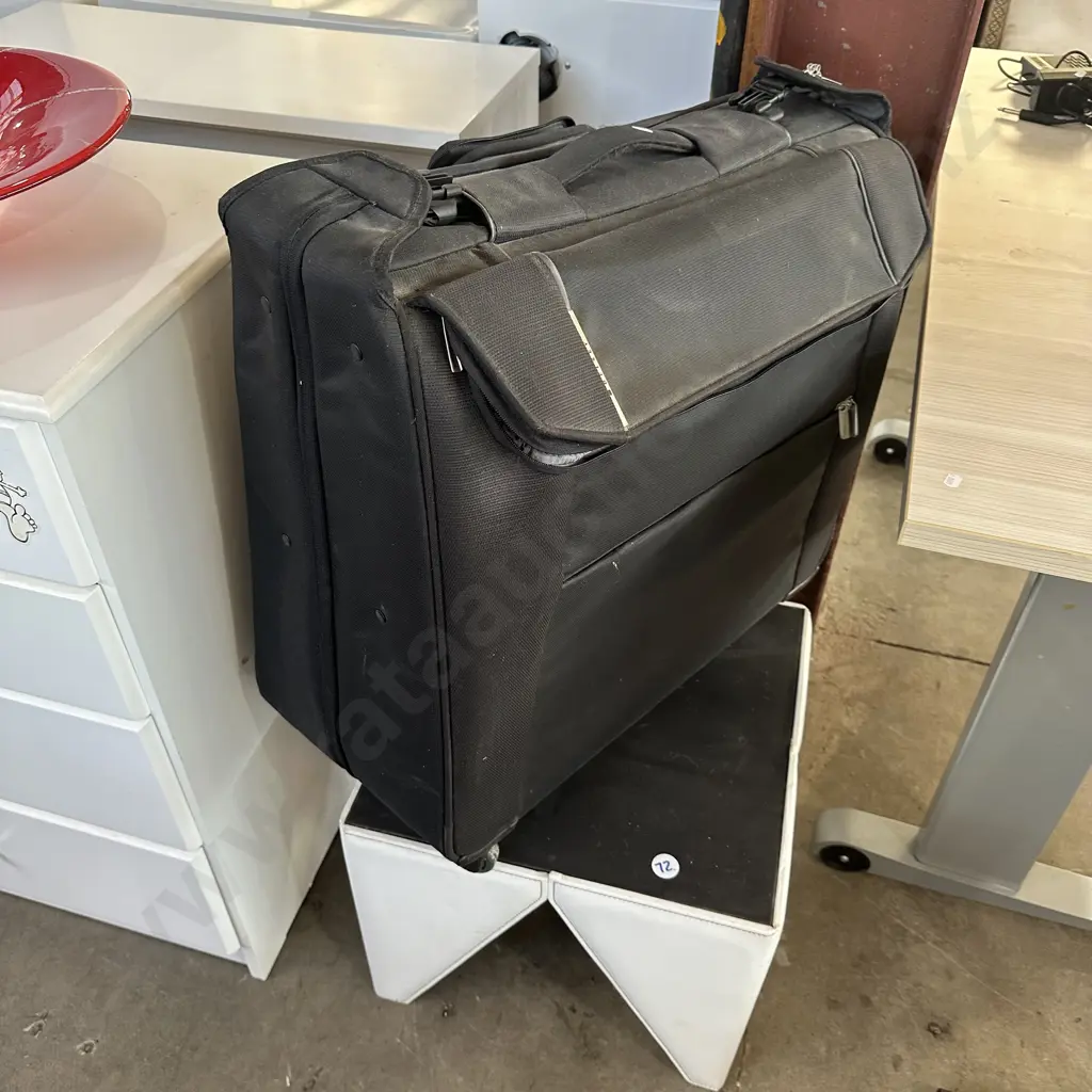 suitcase and foot rest Image 1++