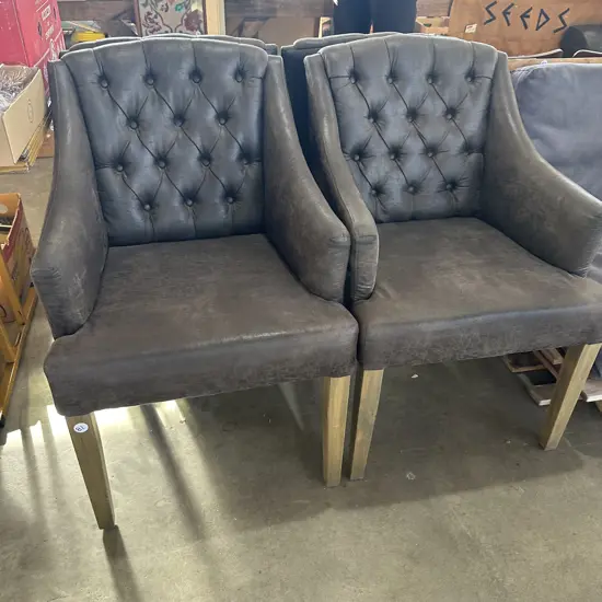 Pr distressed leather button back chairs ex Maddisons (cost $600each)