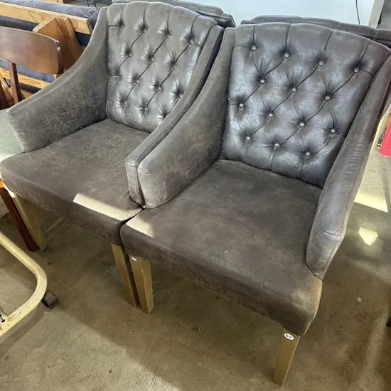 Pr distressed leather button back chairs ex Maddisons (cost $600each)