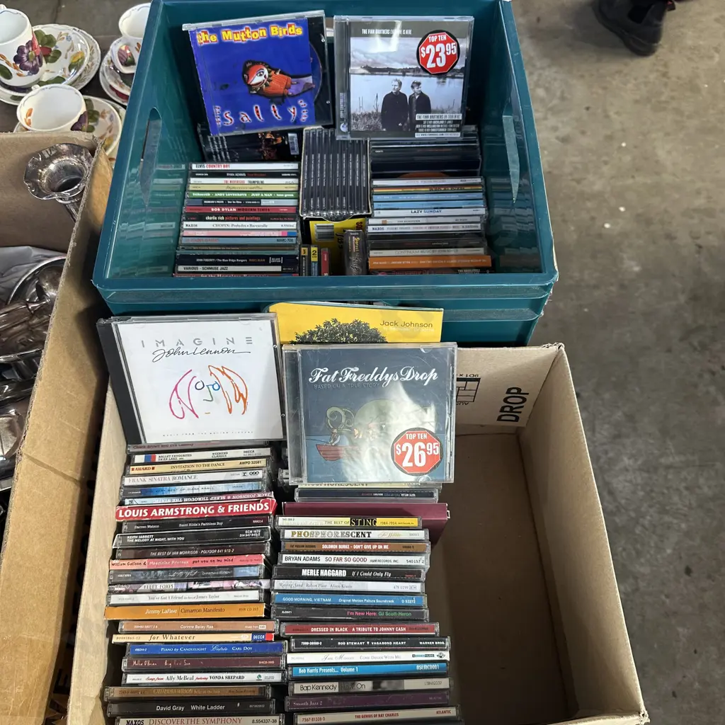Two boxes of good CDs including John Lennon and Jack Johnson. Image 1++