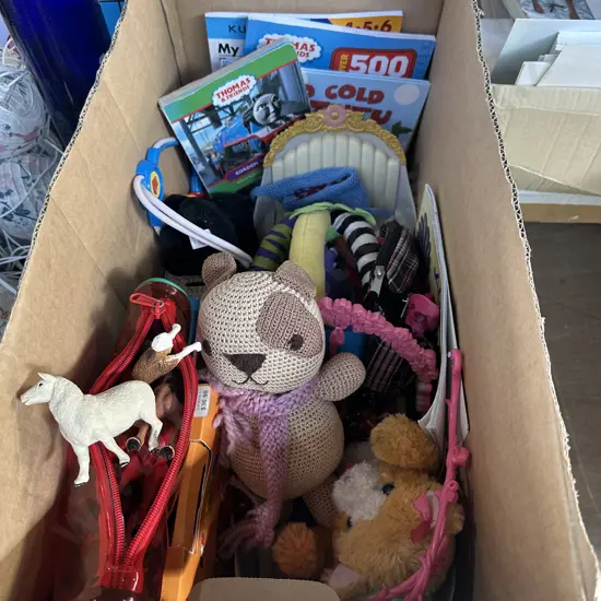 Box of childrens toys, books, animal ornaments etc.