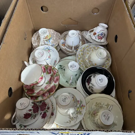 Box of tea sets inclucing Royal Albert.