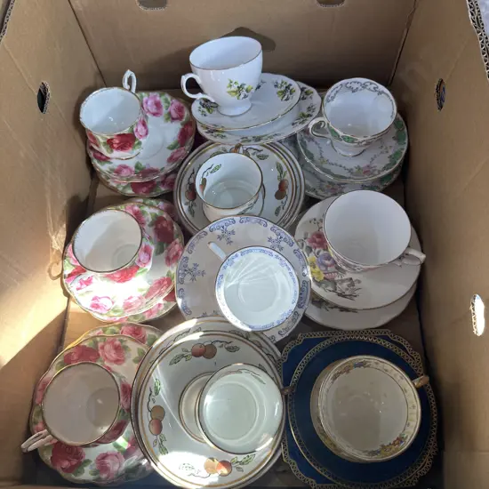 Box of china tea sets including Royal Albert "old English rose" etc.