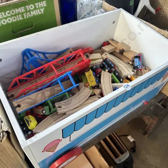 Toybox full of train set.