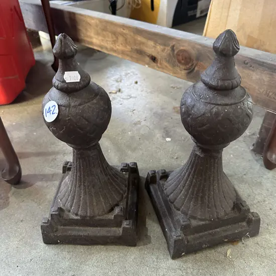 Pair of cast iron finials.