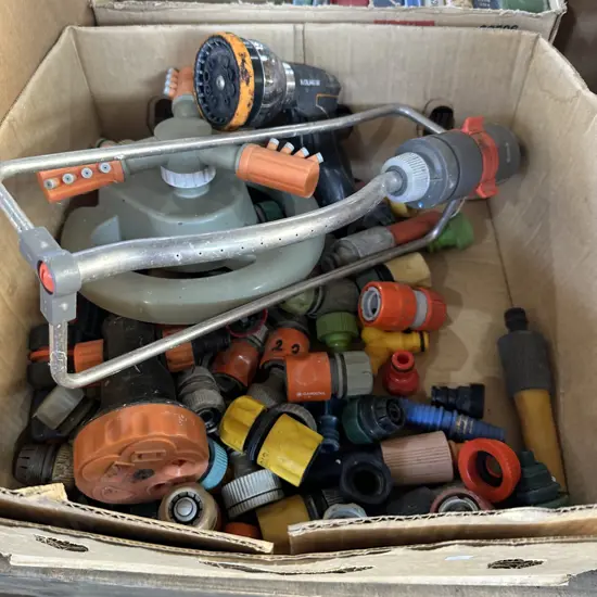 Box lot of hose fittings plus sprinklers.
