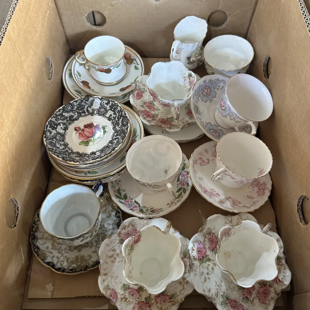 Box of china tea sets plus china plates and saucers. Image 1++