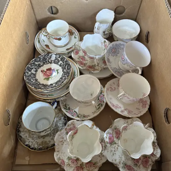 Box of china tea sets plus china plates and saucers.