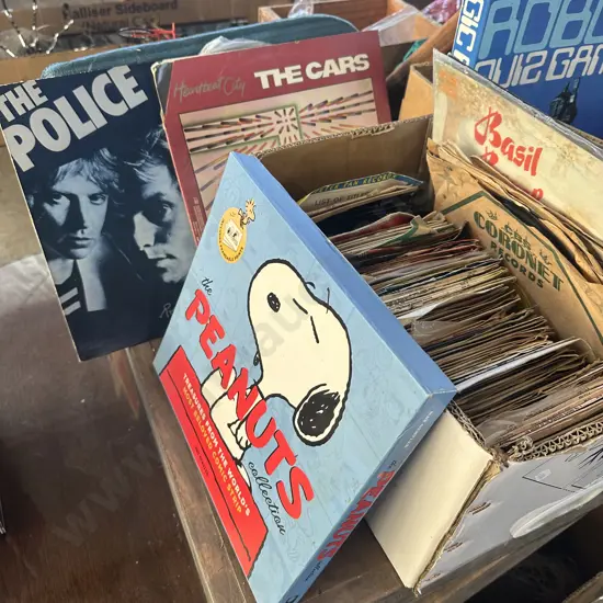Box of records - 45s, 78s, the peanuts collection, the cars, the police etc.