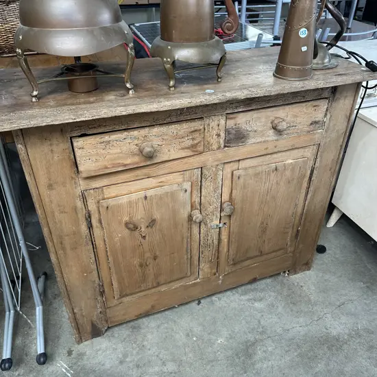 rustic kitchen cupboard with borer