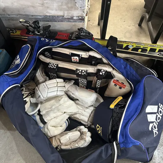 Cricket gear with bag and skis.