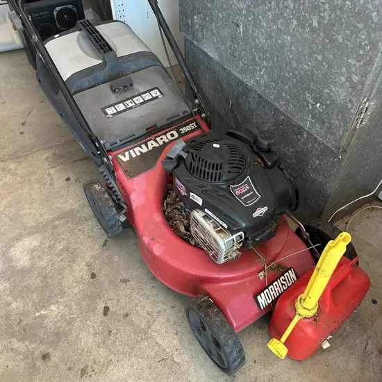lawn mower plus fuel can - sold as working