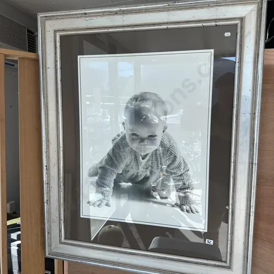 large framed photo of baby