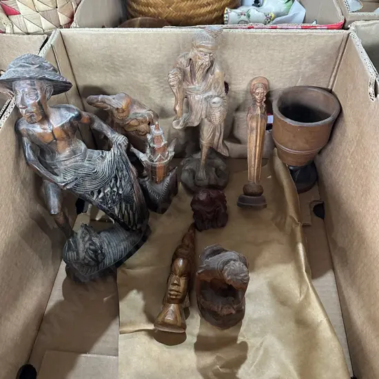Box of carved figures etc.