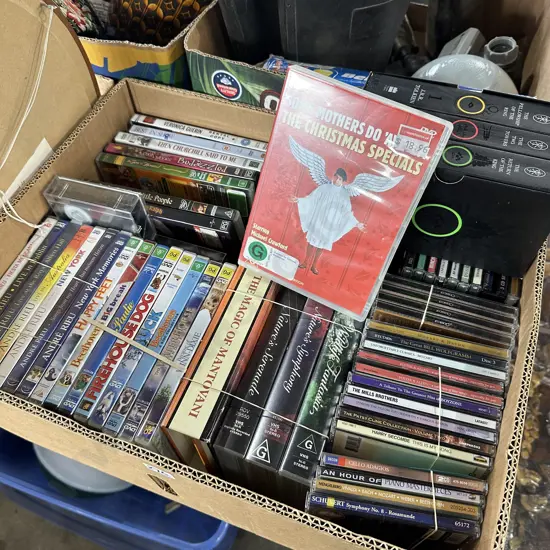 Box lot CDs, DVDs, videos and books.