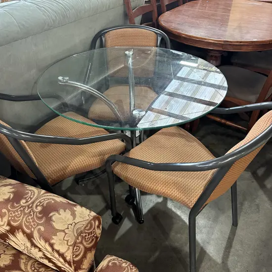 glass top table & 3 chairs on wheels