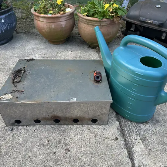 smoker, water can and hose fitting