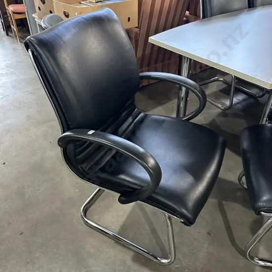 7 very expensive leather boardroom chairs