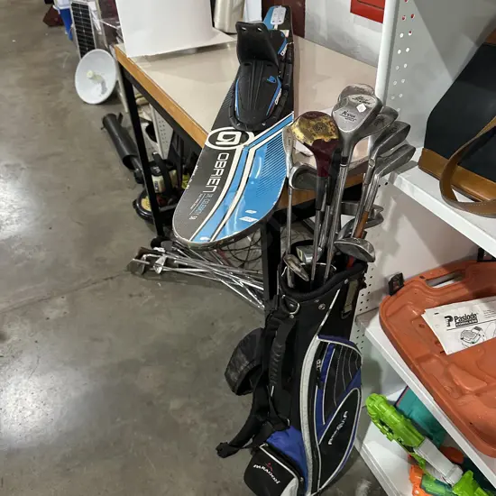 single ski, golf clubs and bag ( bag not working correctly )
