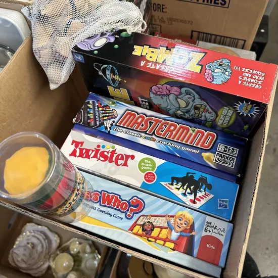 Box lot of kids games including juggling balls etc.