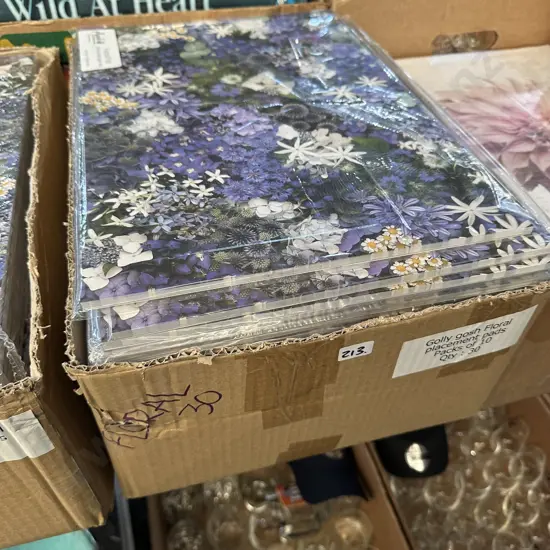 Box lot of "golly gosh" placemat pads.