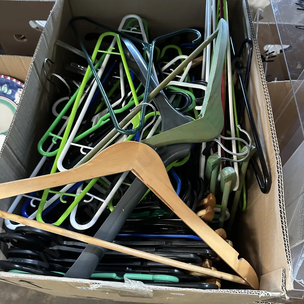 Large box full of coat hangers, some wooden. Image 1++