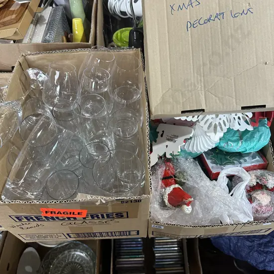 Two boxes christmas decorations and glassware.