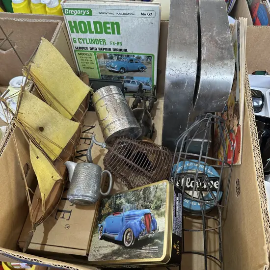Box lot metal D and C letters, clock and ornaments, book and MAD comic etc.