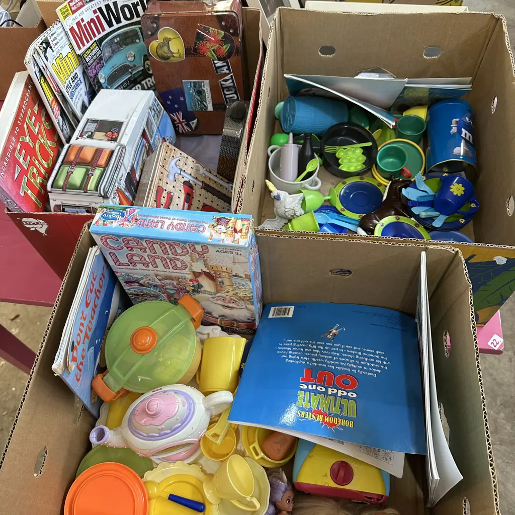 Three boxes of childrens toys, books and magazines. Image 1++