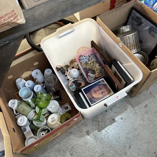 Three boxes of assorted items.