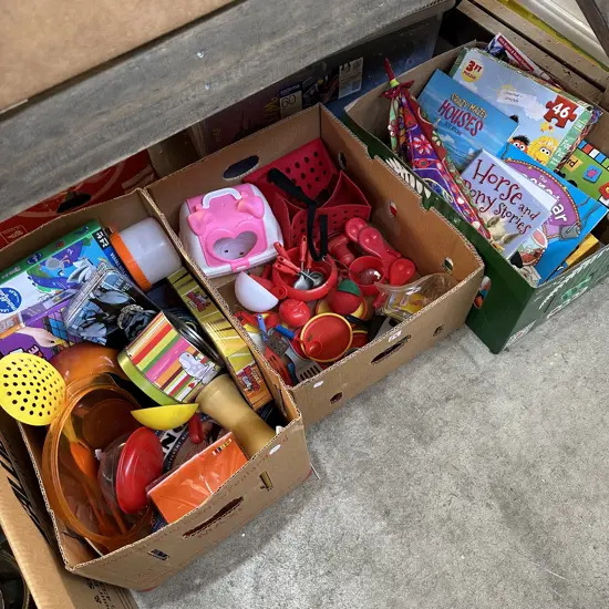 Three boxes of childrens toys.