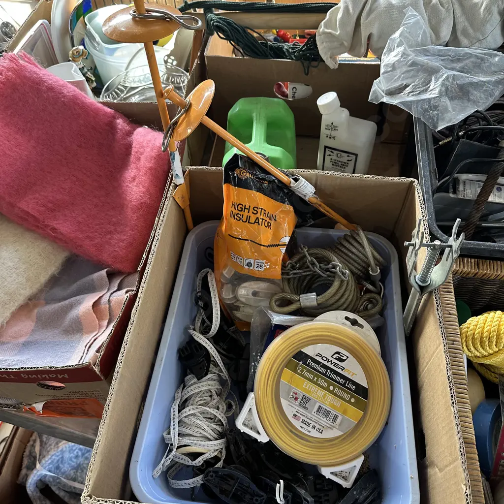 Box lot electric fence insulators, green petrol can, new trimmer line, bike locks etc. Image 1++