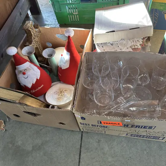 Three boxes wine glasses, pair candle sticke and santa door stops etc.