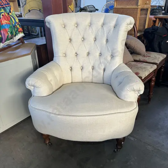 Linen covered button back arm chair
