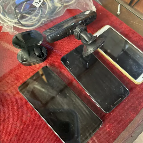 3 phones, earpods and dash cam