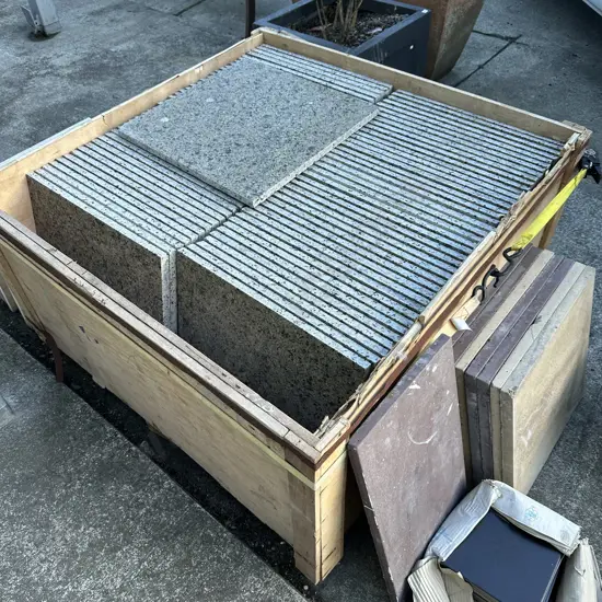 approx 44 tiles 500x500x20 plus other random tiles and pavers