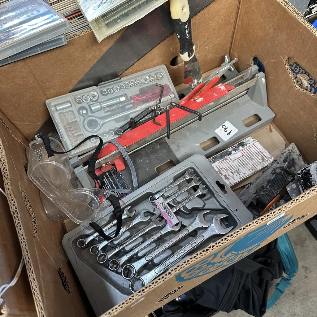 Box lot of tools including tile cutter, socket set and spanners etc. Image 1++