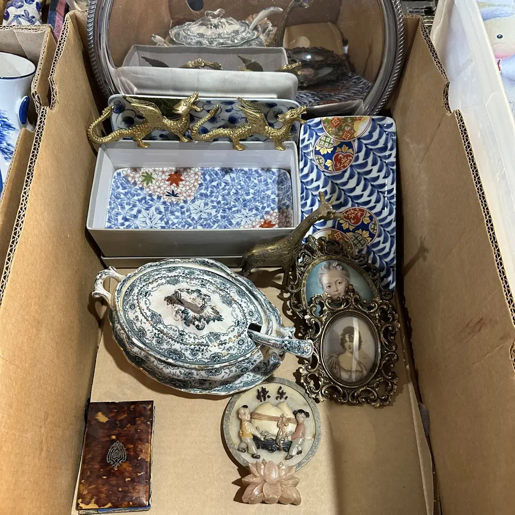 Box lot solid brass giraffe and pair brass dragon figures, silver tray, picture frames etc. Image 1++